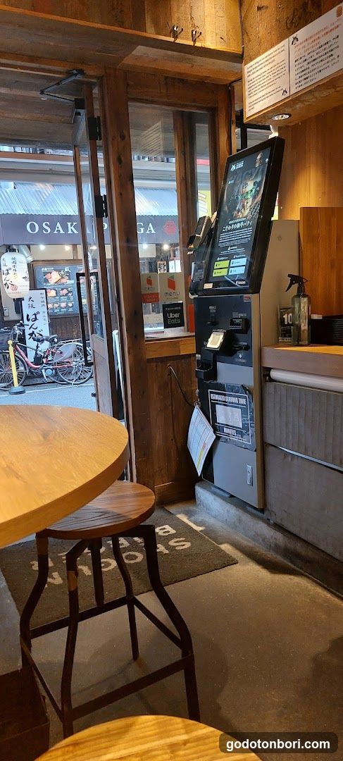 Interior of a shop with entrance and kiosk