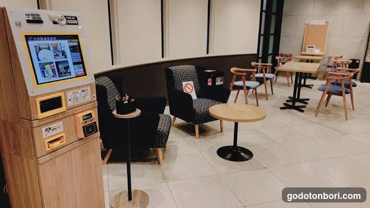 Interior seating area with vending machine