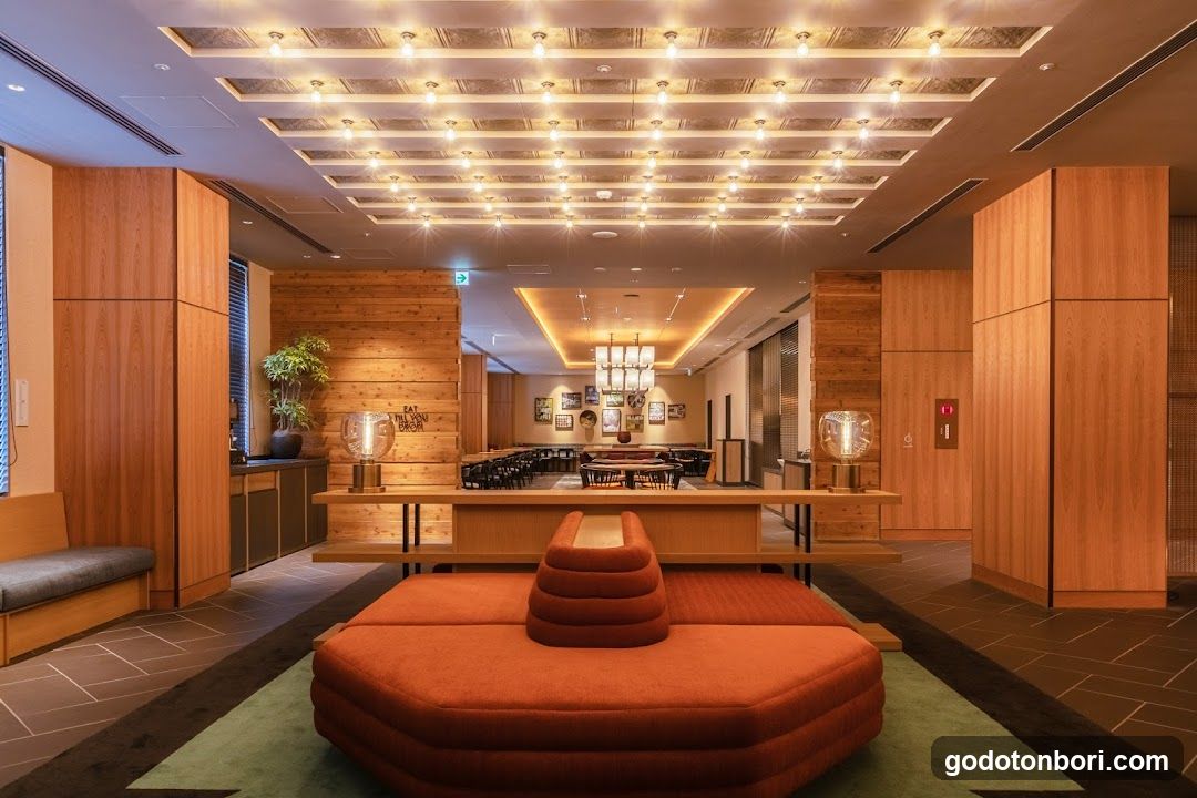 Modern Interior Lounge with Wooden Accents and Orange Seating