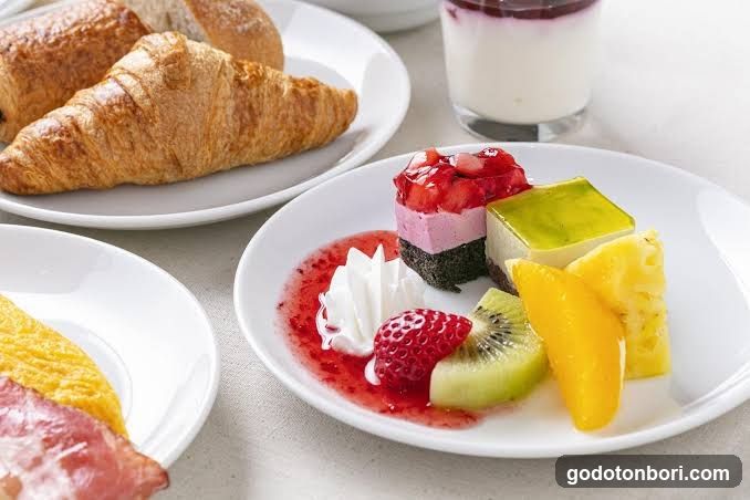 Breakfast Spread with Pastries and Dessert