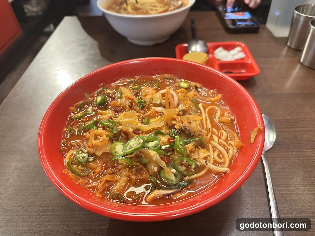 Spicy Noodle Bowl with Chili Peppers and Kimchi