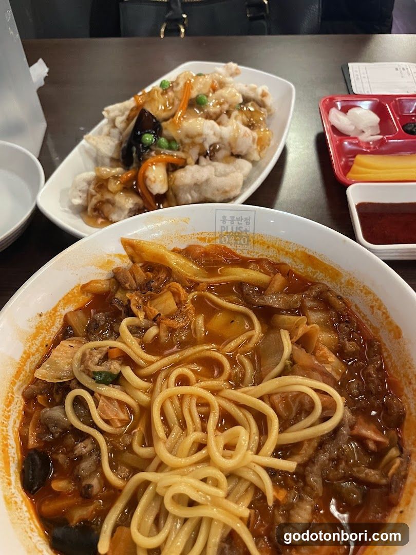 Korean-style noodle and stir-fry meal