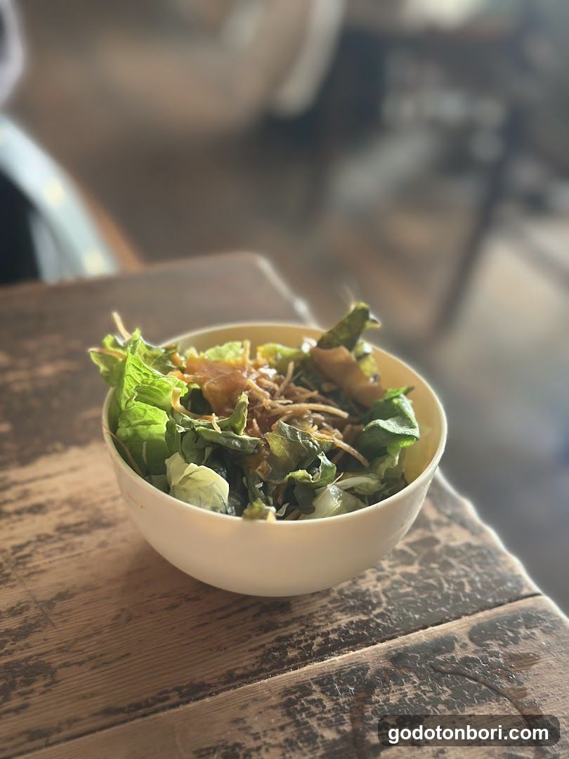 Bowl of Salad on Wooden Table