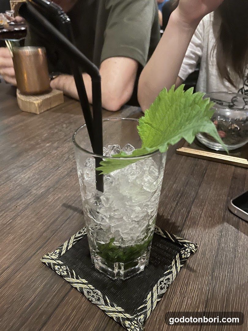 Cocktail with Suze Leaf Garnish