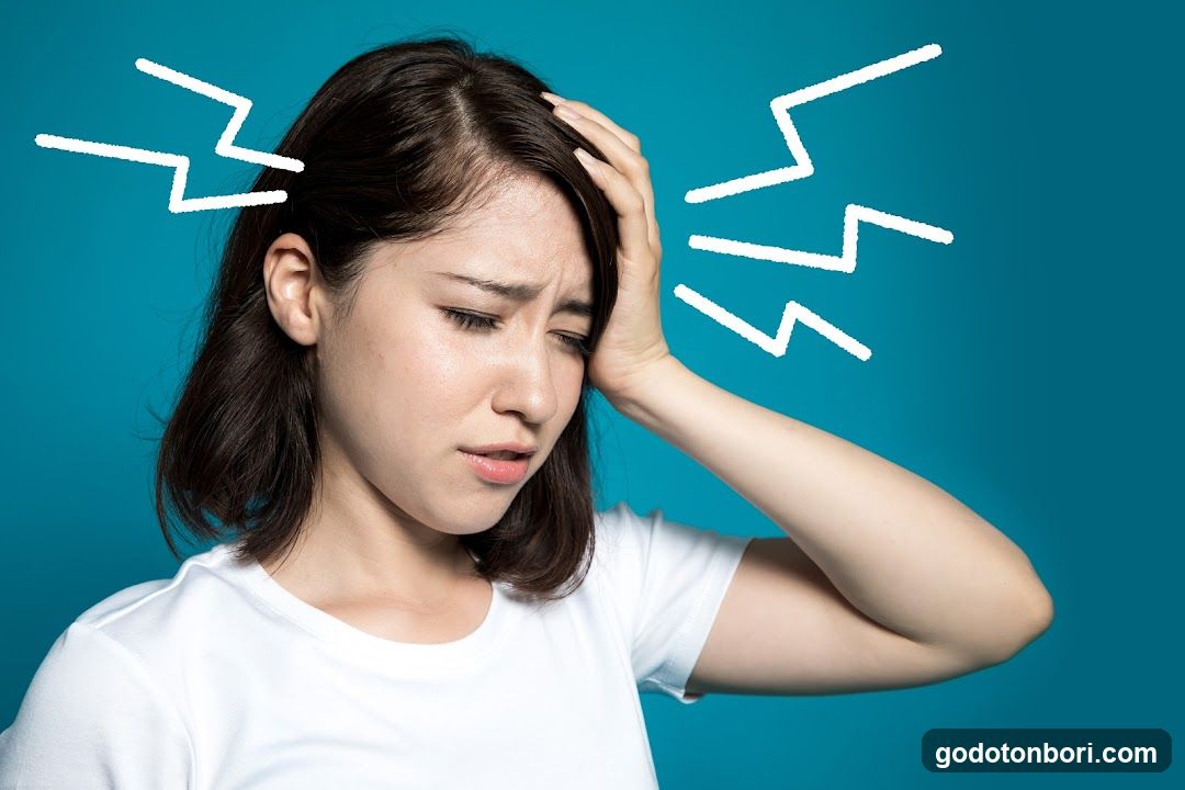 Woman with head pain