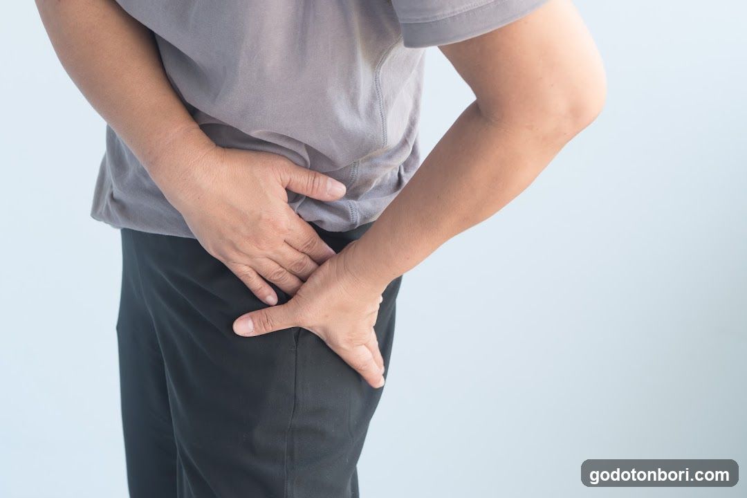 Person holding stomach area