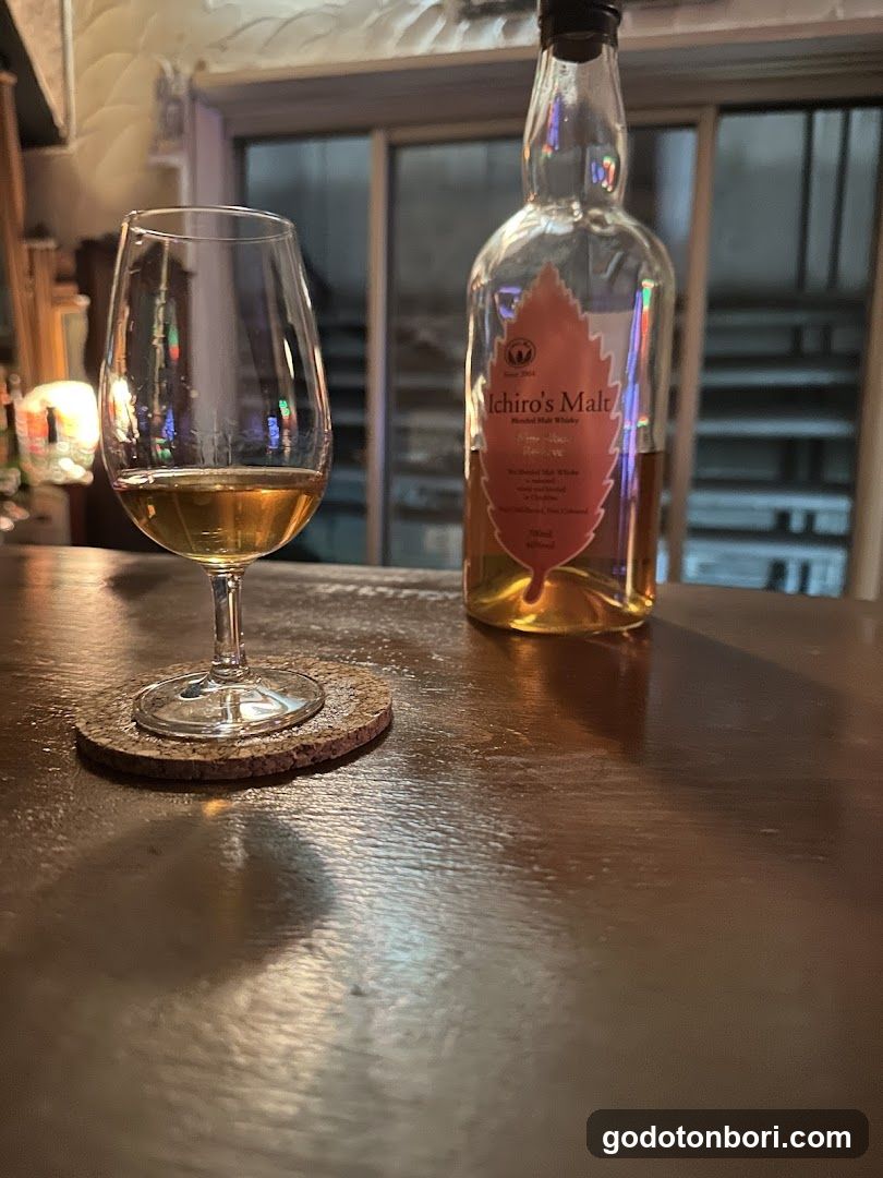 Bottle and glass on table