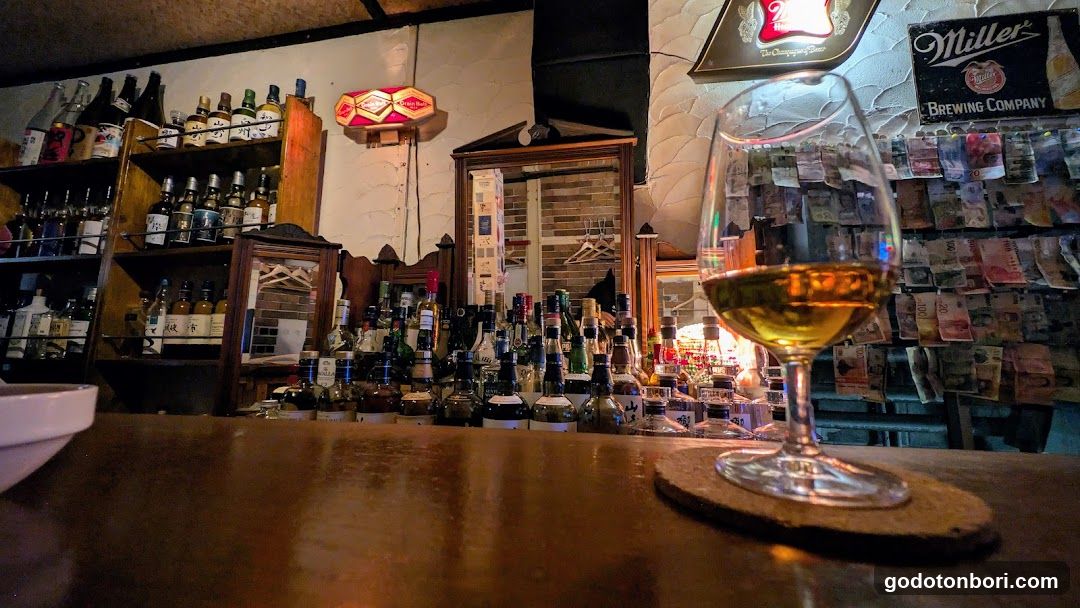 Bar Interior with Liquor Bottles and Miller Sign