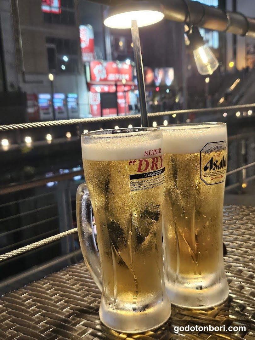 Beer glasses on a table at night
