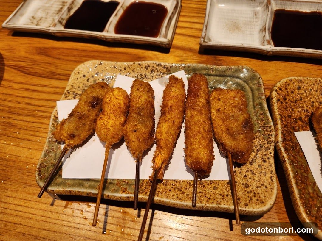 Fried Skewers on Wooden Table