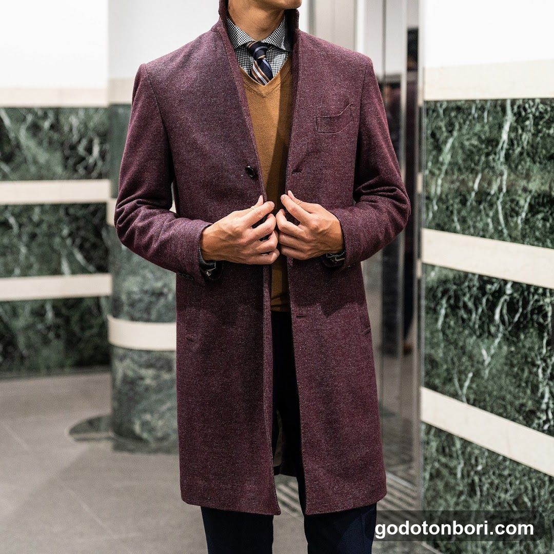 Man in Maroon Coat