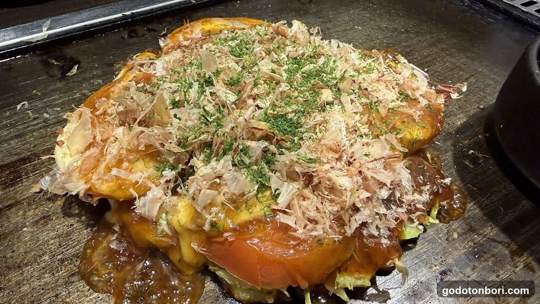Okonomiyaki on a griddle