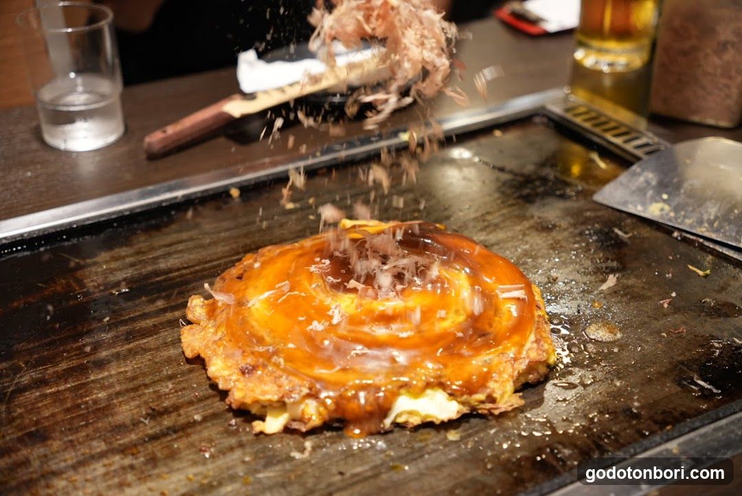 Okonomiyaki being prepared