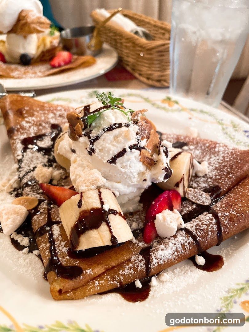 Banana Crepe with Ice Cream and Strawberries
