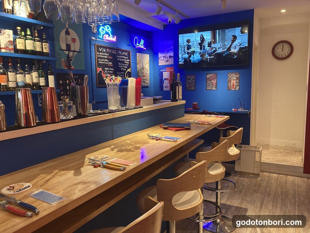 Bar Interior with Blue Walls and TV Screen
