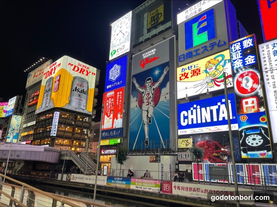 Night Cityscape with Billboards and Neon Signs