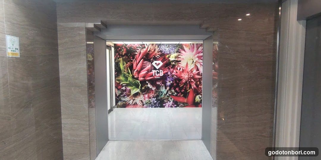 Elevator Interior with Floral Wall Art