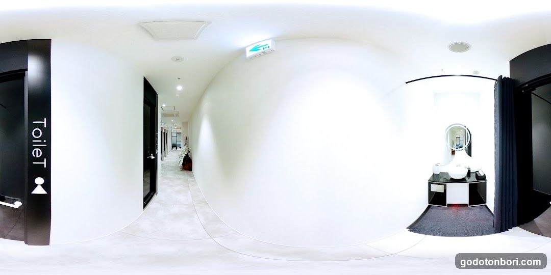 Modern Interior with Vanity and Restroom Signage