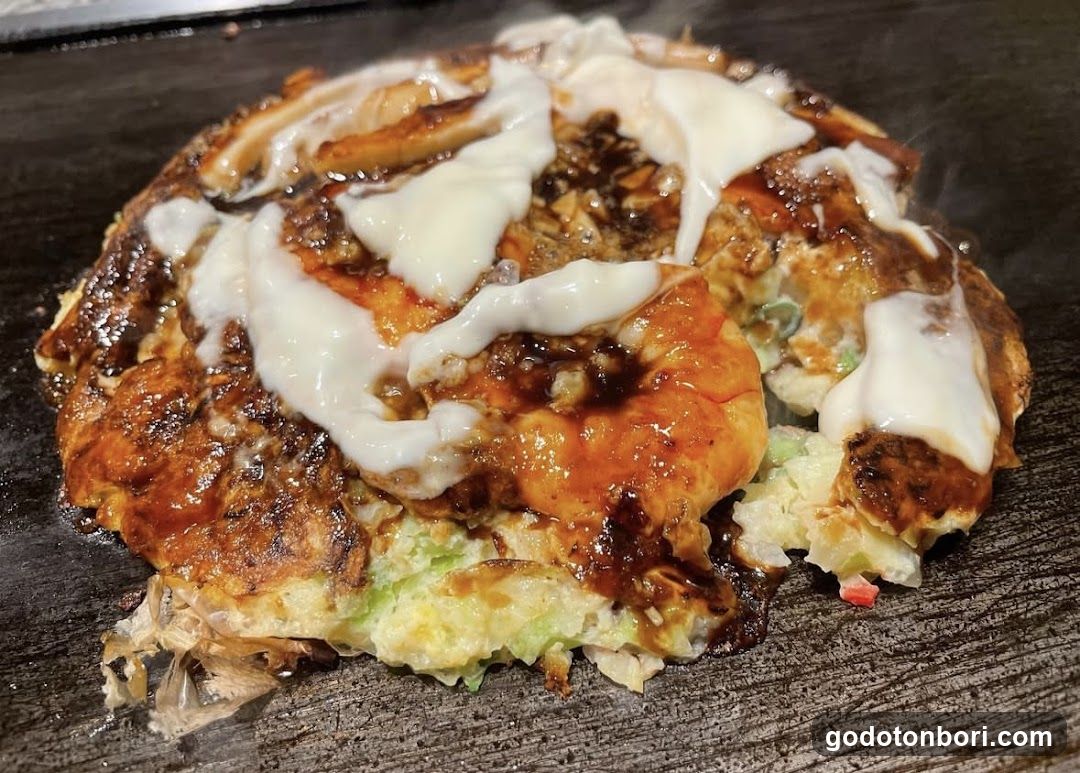 Okonomiyaki on a griddle