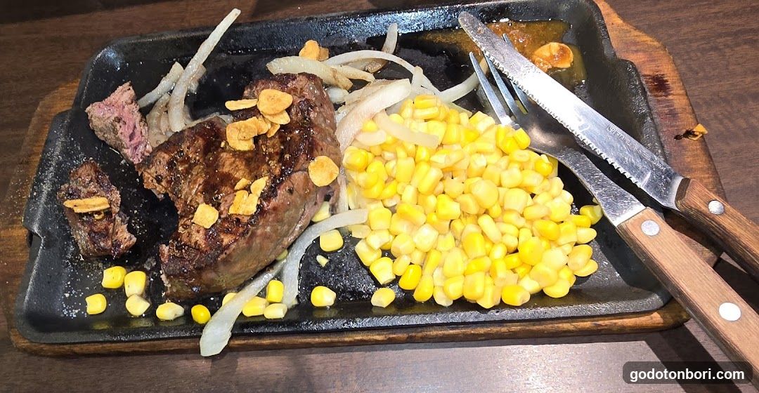 Sizzling Steak with Corn and Onions