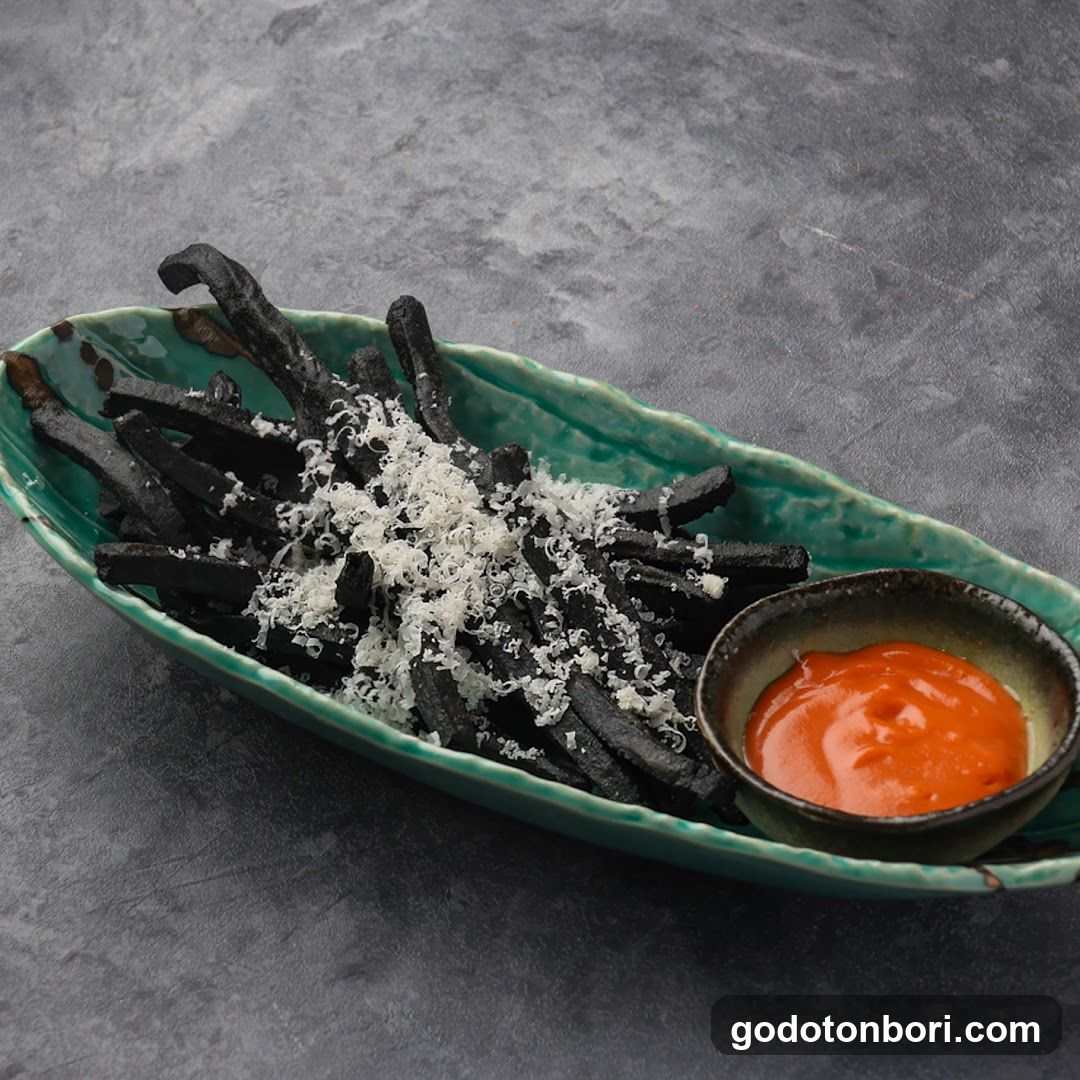 Black Fries with Cheese and Sauce