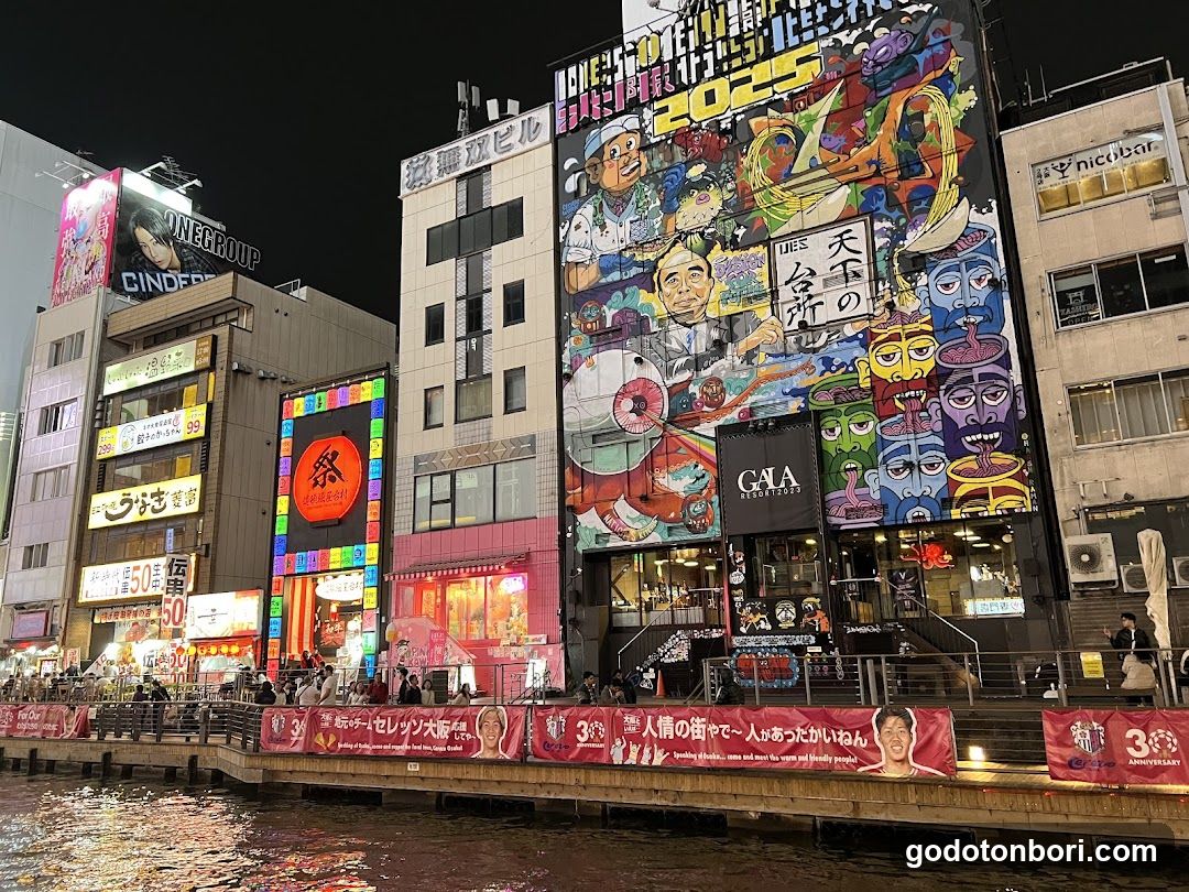 Dotonbori Night Scene with Murals and Shops
