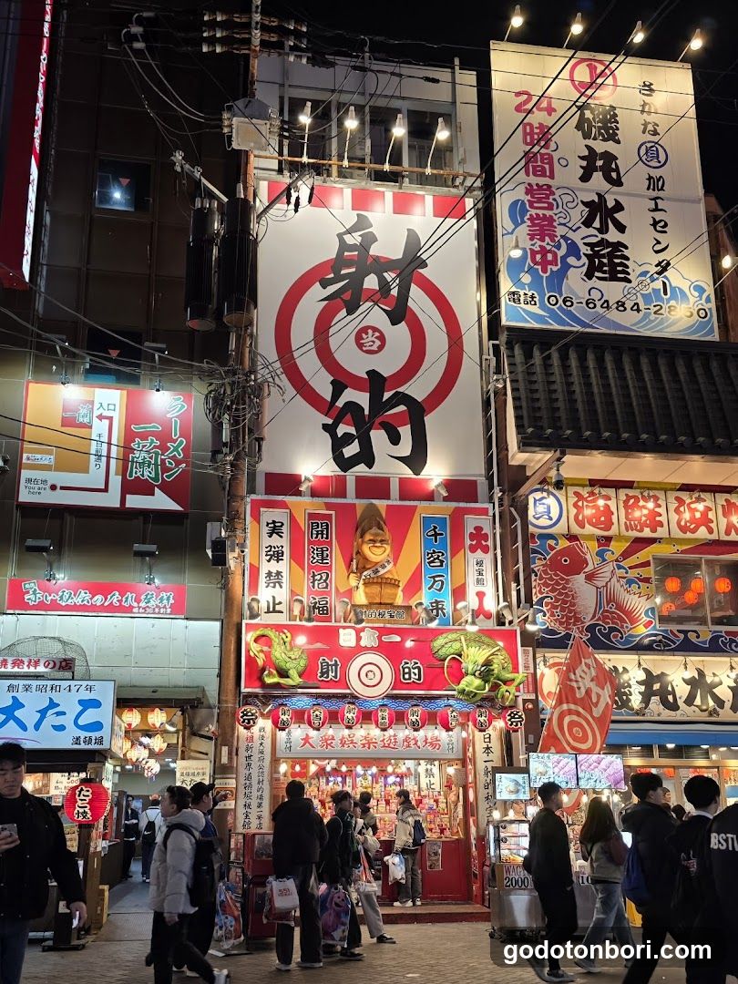 Night Street Scene with Shops and Signs