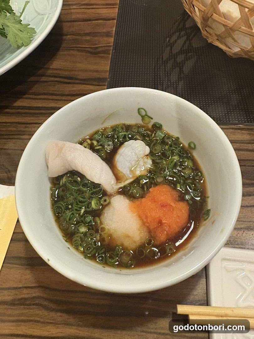 Bowl of Soup with Tofu and Scallions
