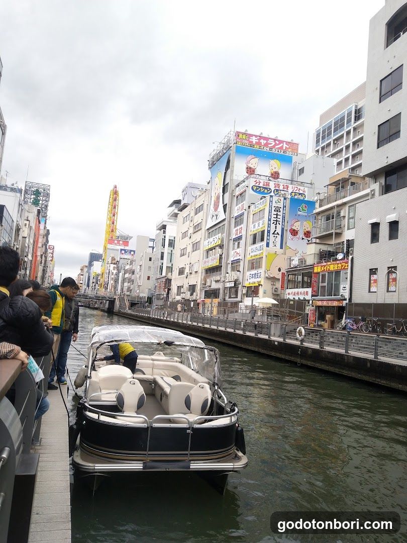 Canal scene with boat and buildings