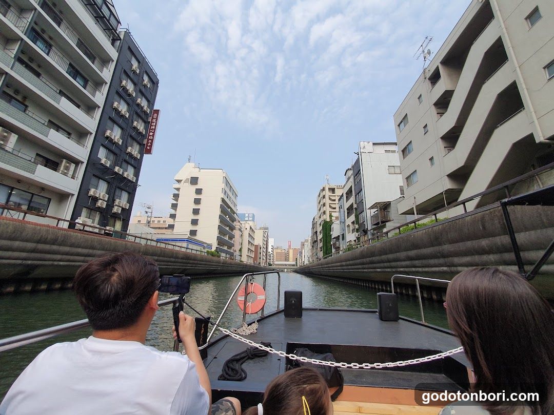 Canal Boat Ride in Urban Setting