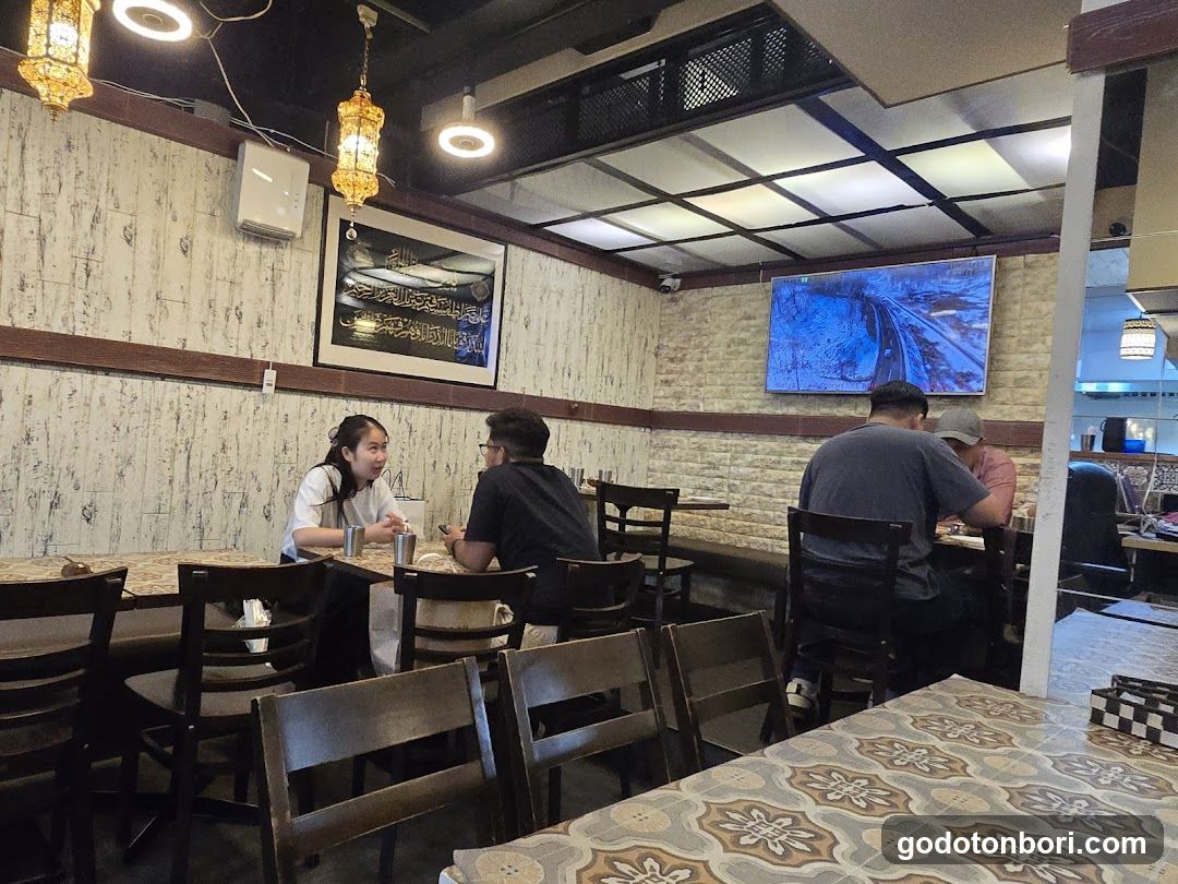 Restaurant Interior with Patrons Dining