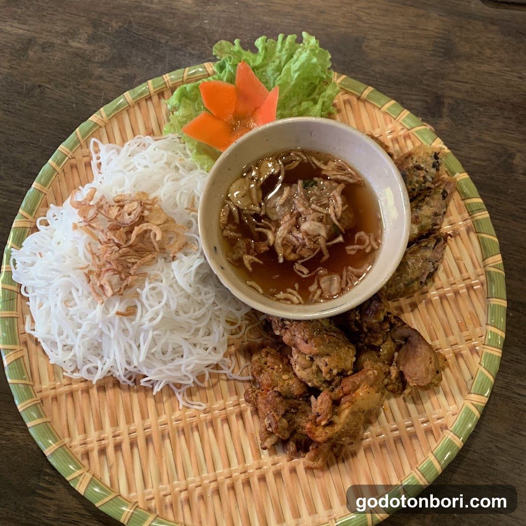 Vietnamese Rice Noodle Dish with Meat and Broth