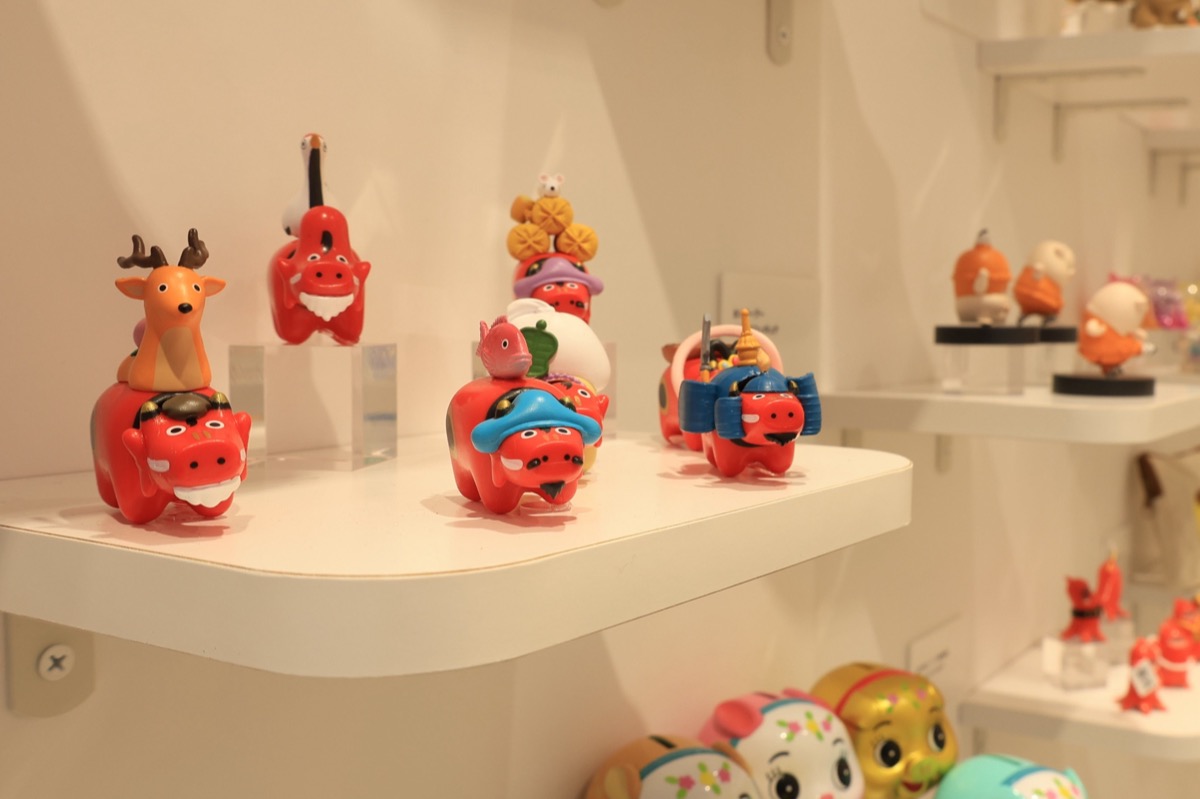 Past Qualia capsule toys on display