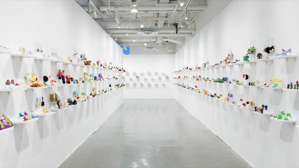 Qualia exhibition hall with capsule displays
