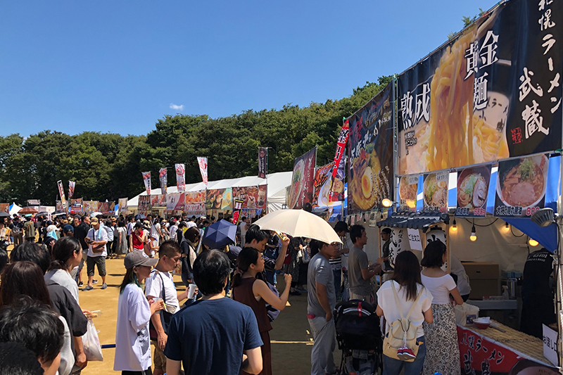 Food stalls and visitors at a past YATAI Fes