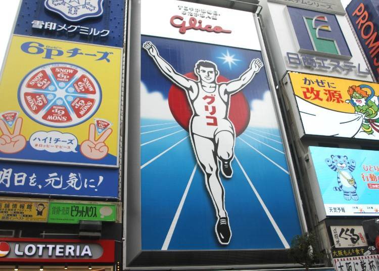 Glico sign viewed from a Tombori River cruise boat in Dotonbori